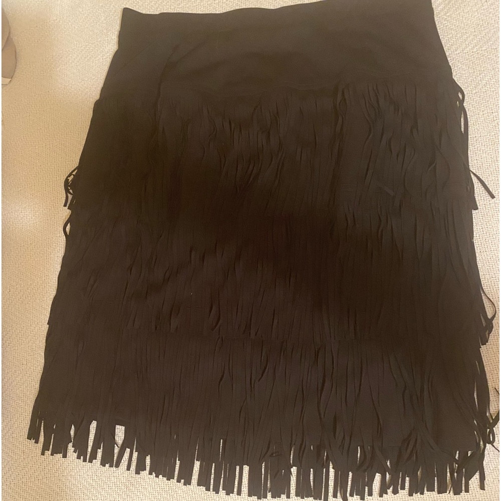 Party time in the cute '20's rag skirt.
